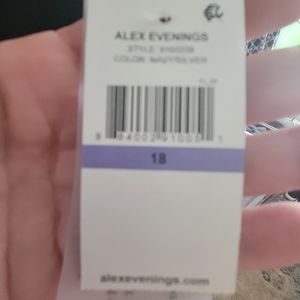 Navy blue embellished dress size 18 fits like a 16W . Sheer sleeves